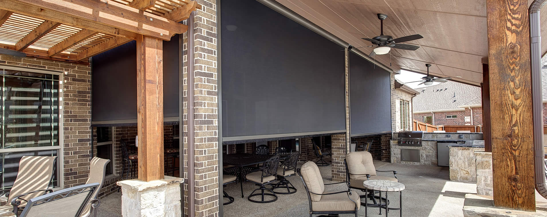Dallas/Fort Worth backyard pool and patio enclosure with retractable shade walls, Texas.